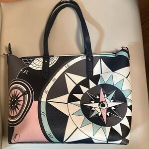 Tory Burch hand bag. Multi color. Handle is worn out in one spot.